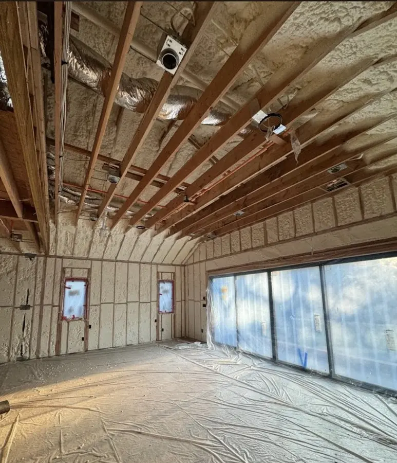 Interior walls and ceiling insulated with spray foam during new construction in Fernandina Beach